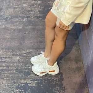 Women’s Gucci Rhython leather sneaker.